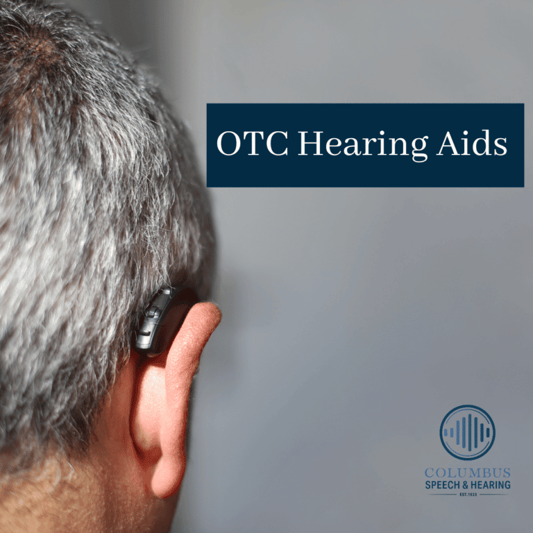 Back of person's head and they are wearing a hearing aid.   Text reading OTC Hearing Aid to the right of the head.