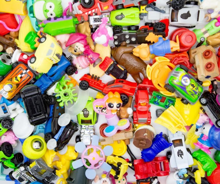 a large group of mini toys in a variety of colors.
