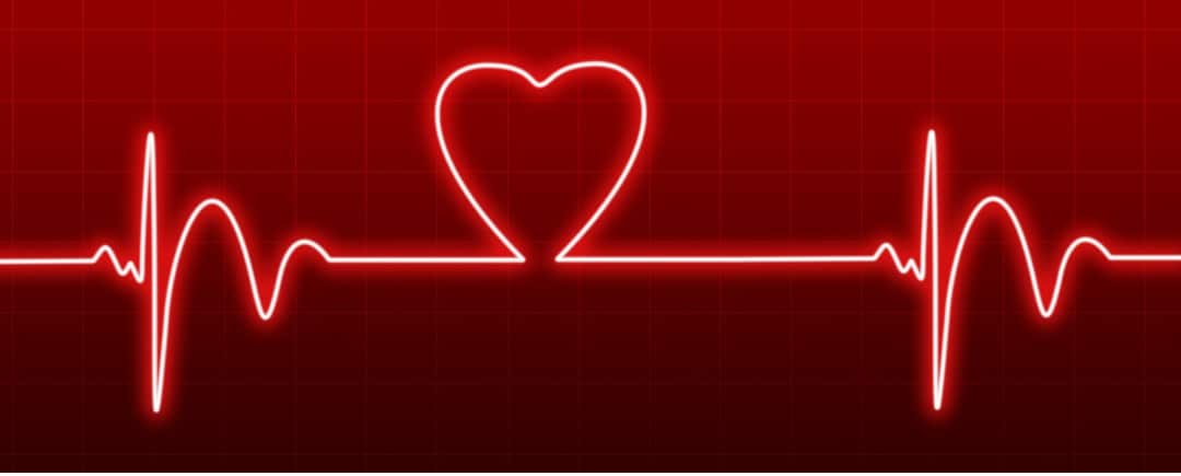 Red background with a faded grid. A heart beat line with a heart shape in the center.