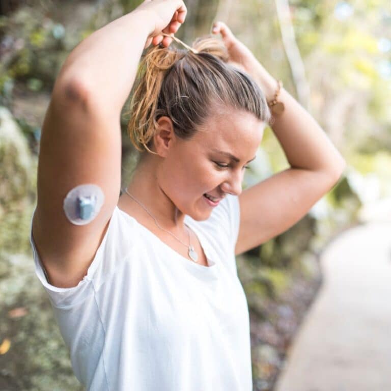 Woman with a glucose monitor